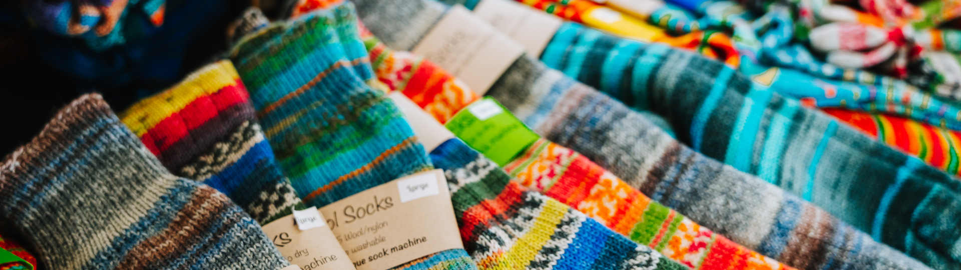 colourful homespun socks on display at the artisan market