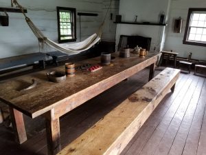 long wooden table inside the Sailors’ Barracks