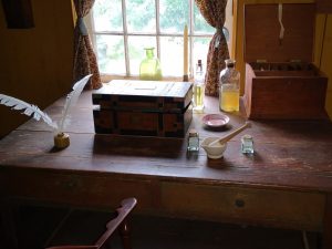 desk with quill pen inside the Assistant Surgeon’s House
