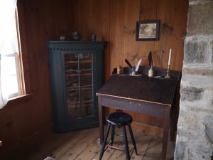 desk and armoire inside of Home of the Clerk-in-Charge