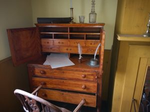 desk inside of Commanding Officer