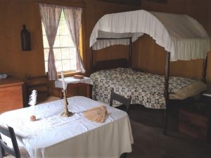 bedroom/dinning area inside of Commanding Officer
