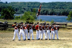 Drill practice with a group British soldiers (reenactment)