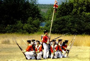 Drill practice with a group British soldiers (reenactment)