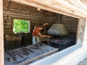 large open window view of inside the Blacksmith Shop